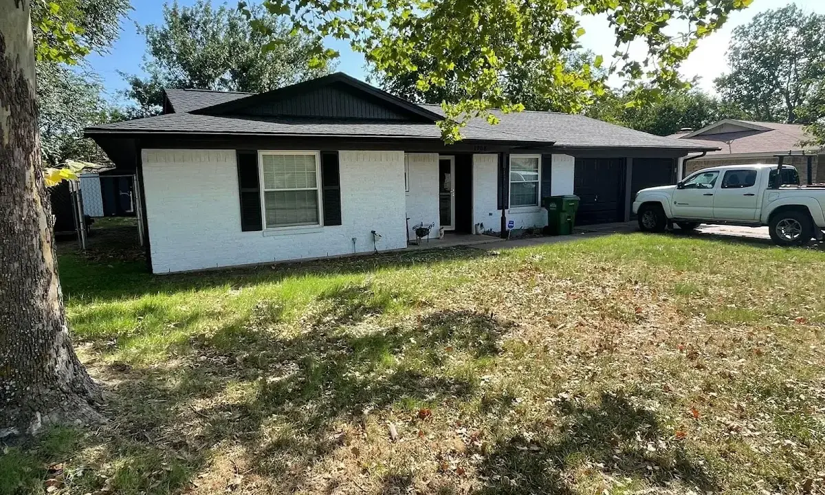 Professional roofing crew working on a residential roof in DuBois